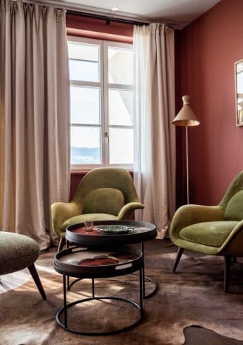 Suite One with a warm red tone on the walls